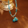 Hyacinth shak yin live burst esmalte goteo aceite azul calabaza colgante turquesa perlas collar mujer suéter cadena gargantilla Application Scenario